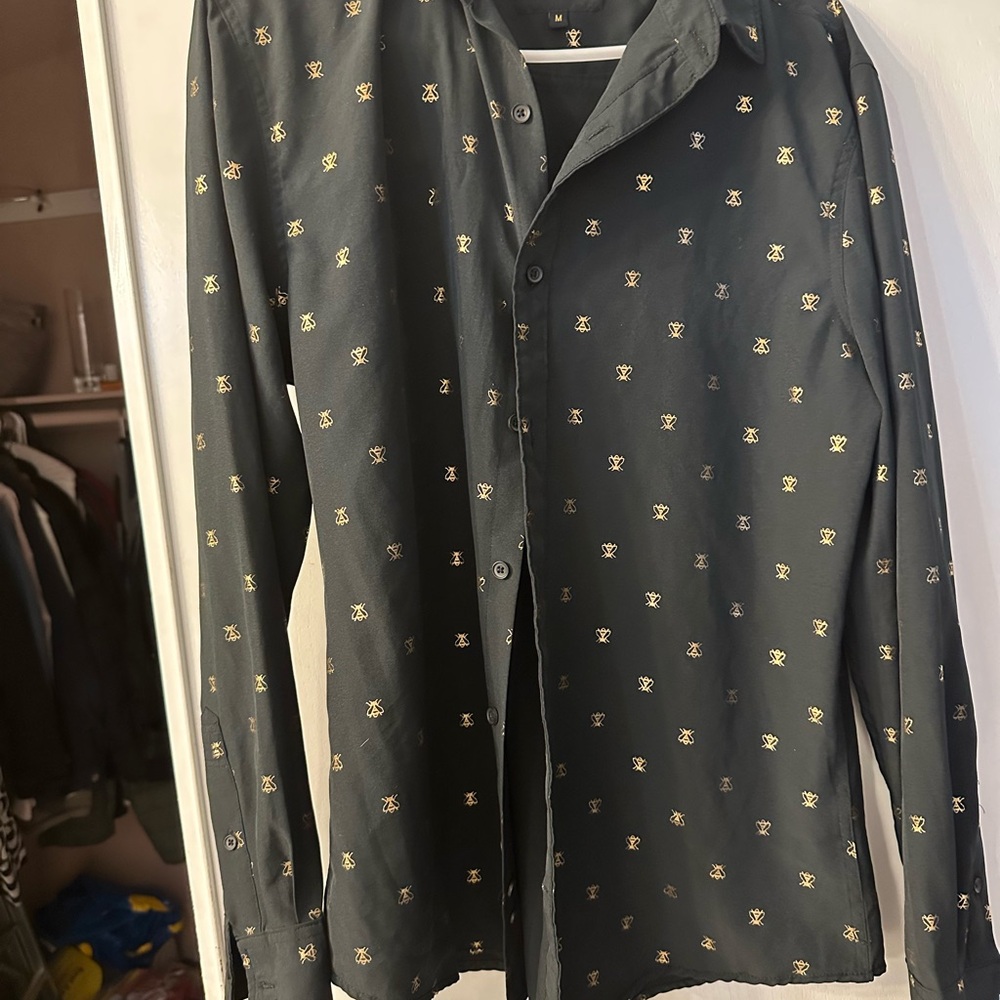 Stylish Black Button Down Shirt with Gold Accents